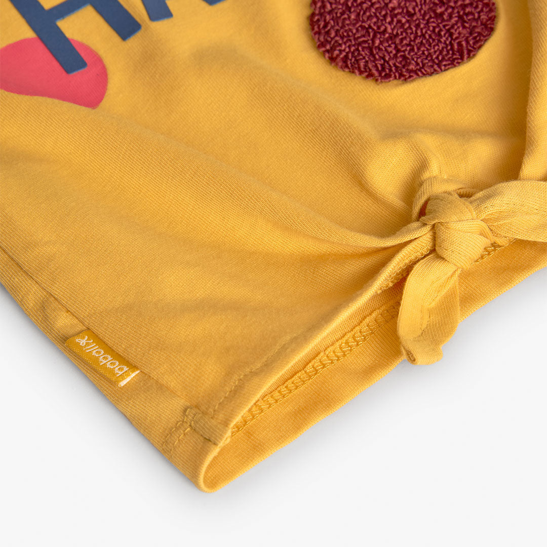 CAMISETA PUNTO AMARILLA